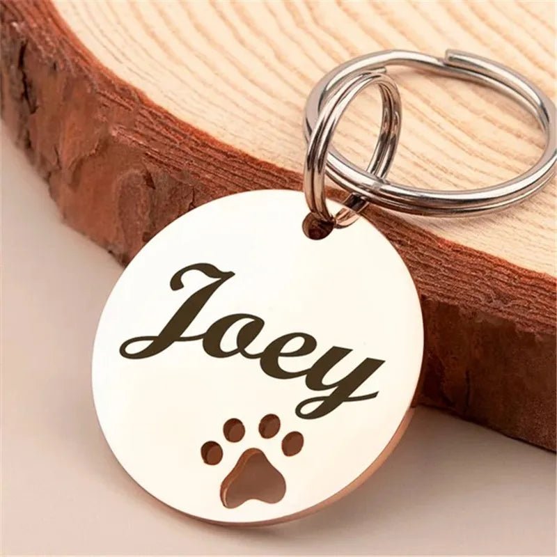 Médaille pour chien gravée en acier inox – modèle rond empreinte patte (personnalisable)