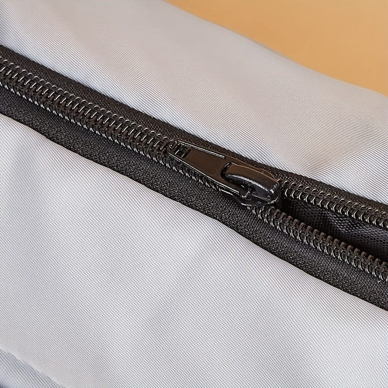 Zoom sur la fermeture éclair noire du sac pour chiens, parfait pour accessoires pour chien
