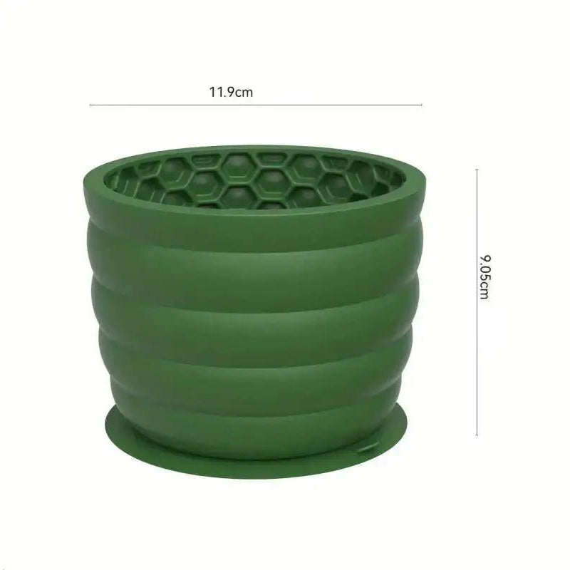 Image d’un bol de léchage pour chien antidérapant en poterie verte à motif nid d’abeille