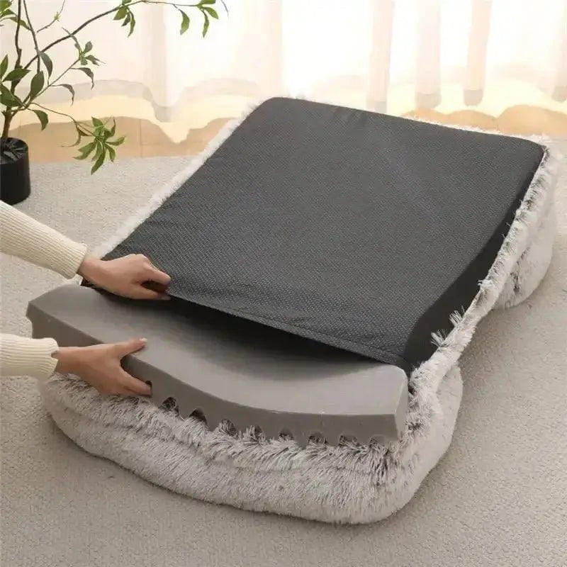 Image montrant un lit moelleux pour chien avec bords confortables décomposé