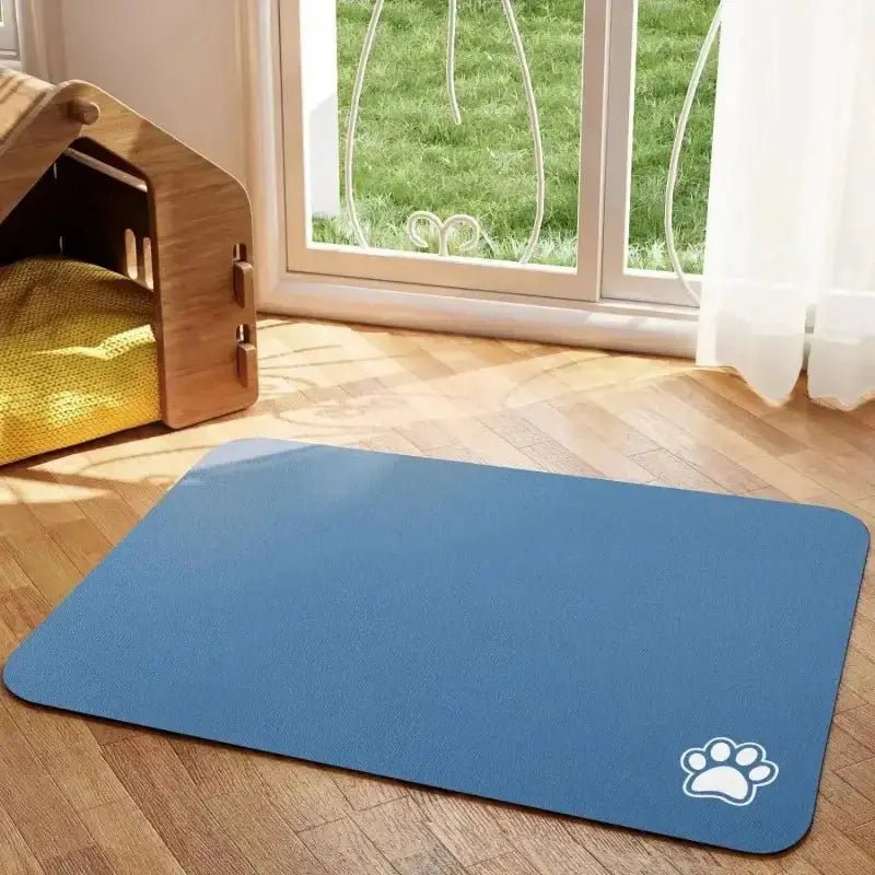 Tapis sous gamelle pour chien antidérapant bleu avec empreintes de patte, facile à nettoyer