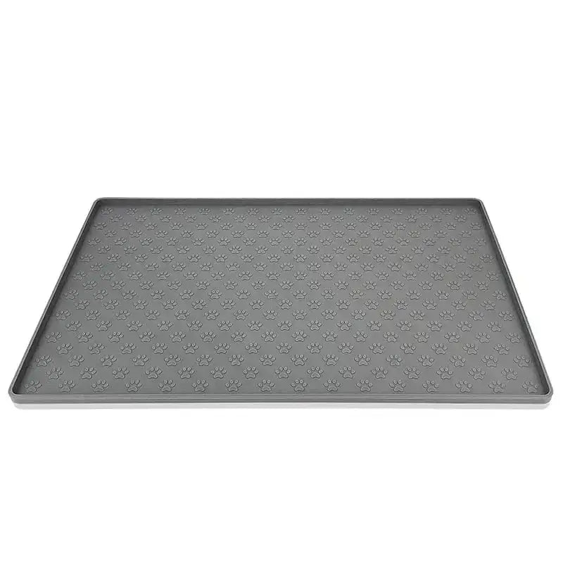 Tapis silicone pour gamelle chien étanche avec rebords et motifs de pattes, pour sol propre