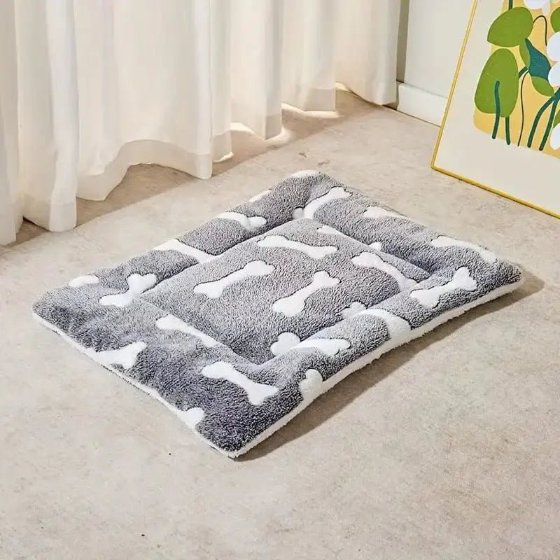 Tapis rembourré pour chien à poser au sol, élégant et lavable, avec motif os blanc