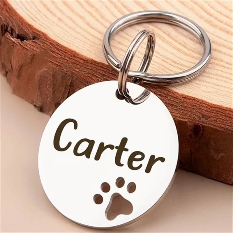 Médaille pour chien gravée en acier inox – modèle rond empreinte patte (personnalisable)