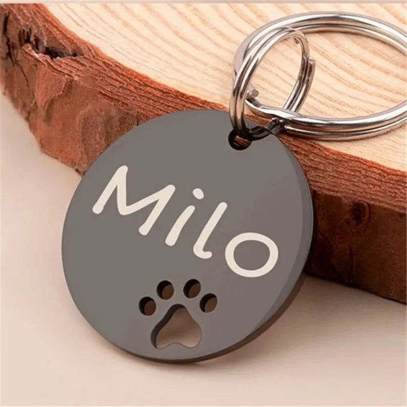 Médaille pour chien gravée en acier inox – modèle rond empreinte patte (personnalisable)
