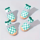 Chaussures antidérapantes pour chien avec motifs verts et blancs, semelle grip
