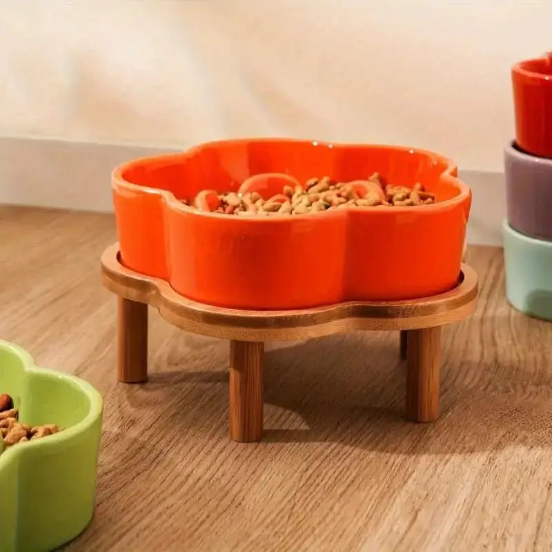 Gamelle anti-glouton pour chien en forme de fleur, design coloré sur support en bois
