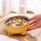 Gamelle sur pied pour chien en inox et plastique rigide, alimentée de nourriture