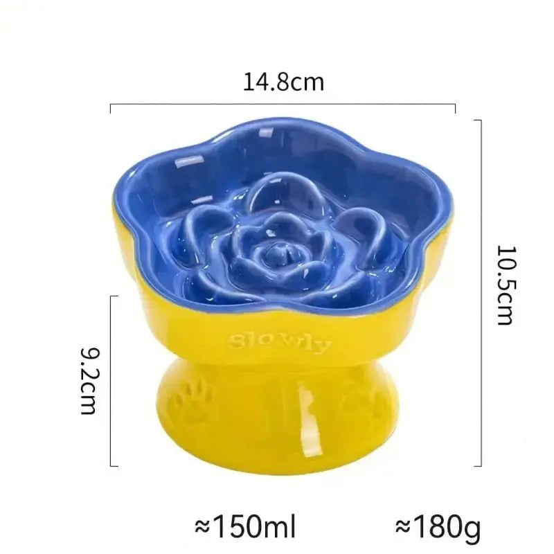 Photo d’une gamelle anti glouton surélevée en céramique pour chien fleur en céramique sur pied