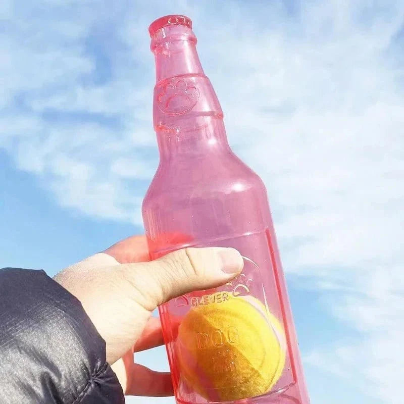 Jouet bouteille avec balle en matériau TPR et tennis intégrée, bouteille rose avec citron