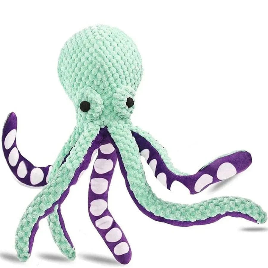 Peluche pieuvre mint verte avec tentacules violettes et blanches, la peluche ultime