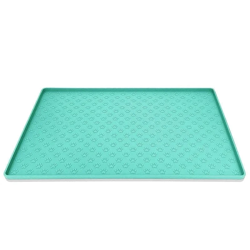 Tapis d’alimentation absorbant turquoise avec empreintes de pattes, facile à nettoyer