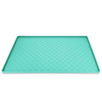 Tapis d’alimentation absorbant turquoise avec empreintes de pattes, facile à nettoyer