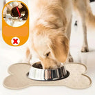 Image dun tapis de protection sous gamelle pour chien en silicone forme os