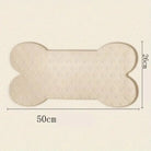 Tapis sous gamelle pour chien antidérapant en silicone forme os avec texture empreinte de patte