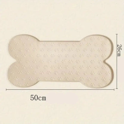 Tapis sous gamelle pour chien antidérapant en silicone forme os avec texture empreinte de patte