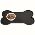 Tapis sous gamelle pour chien antidérapant en silicone forme os avec texture empreinte paw print