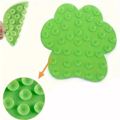 Tapis de léchage pour chien anti-stress en silicone avec reliefs en forme de patte et vert
