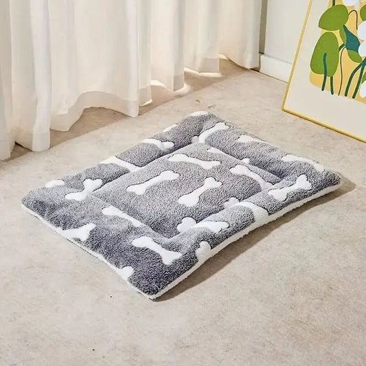 Tapis rembourré pour chien à poser au sol, élégant et lavable, avec motif os blanc
